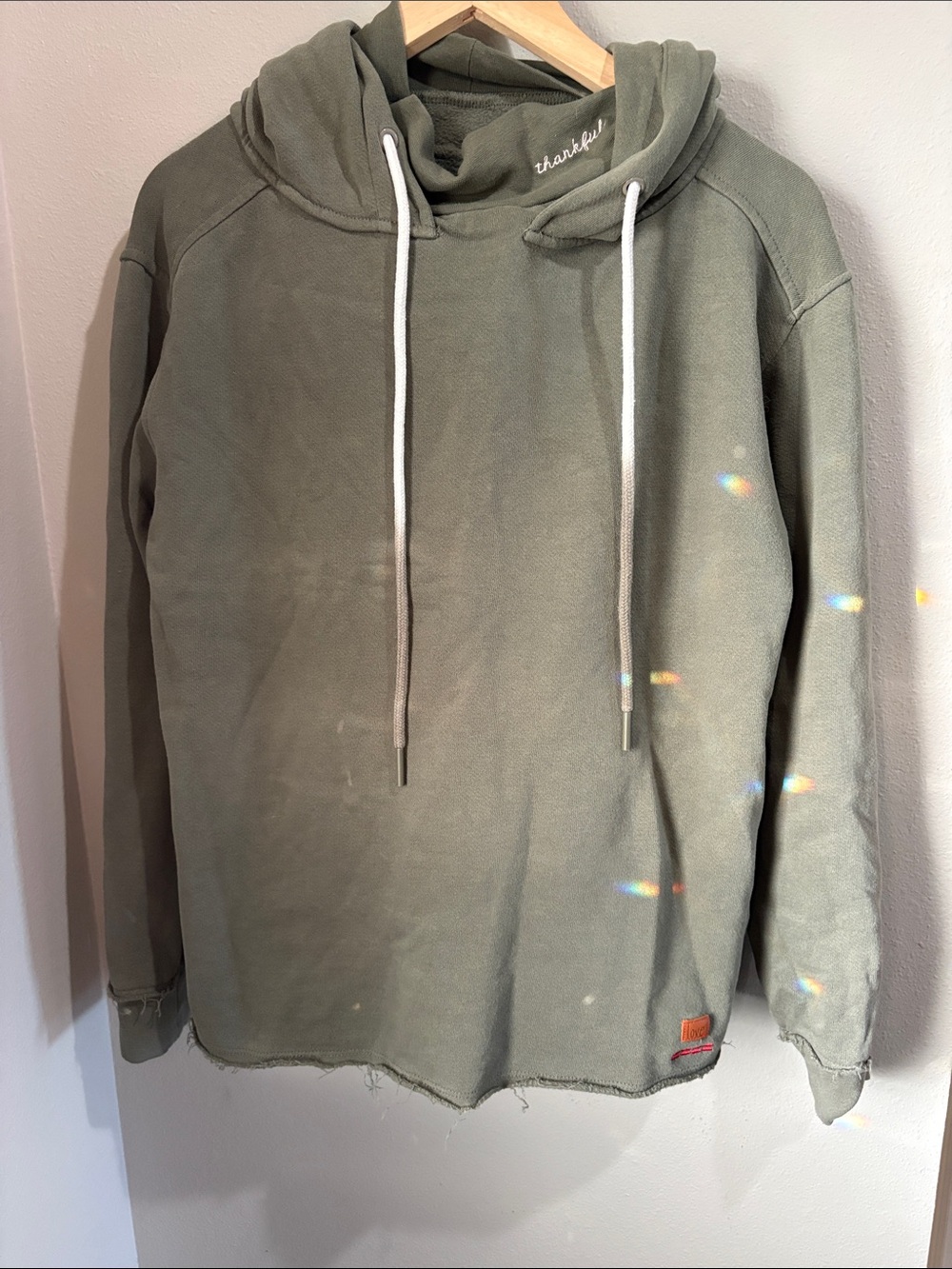 Peace Love World Olive Green Hooded Sweatshirt with quote on back (xxs)